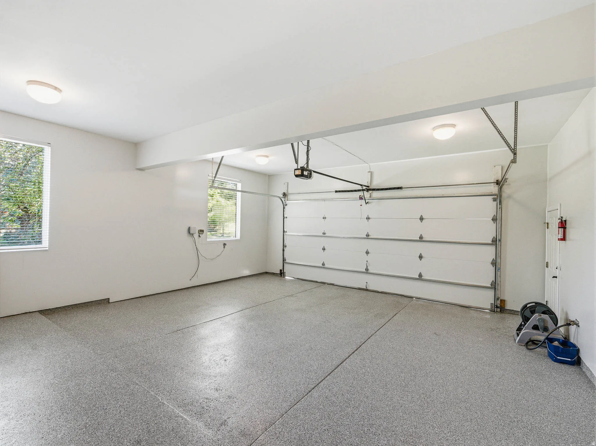 Spacious garage with an epoxy-coated floor