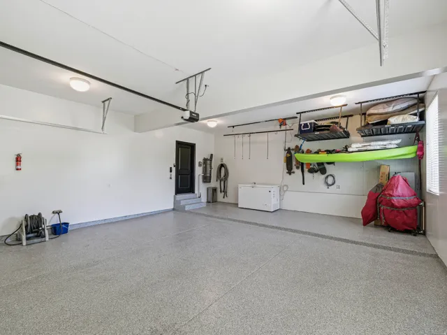Spacious garage with light grey epoxy flooring