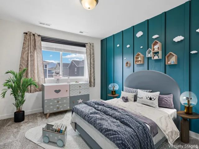 Room featuring a paneled accent wall, a large window, and wall-mounted shelving