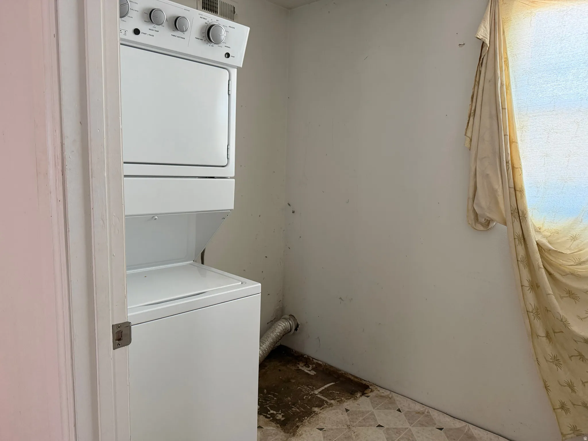 White stackable washer and dryer unit