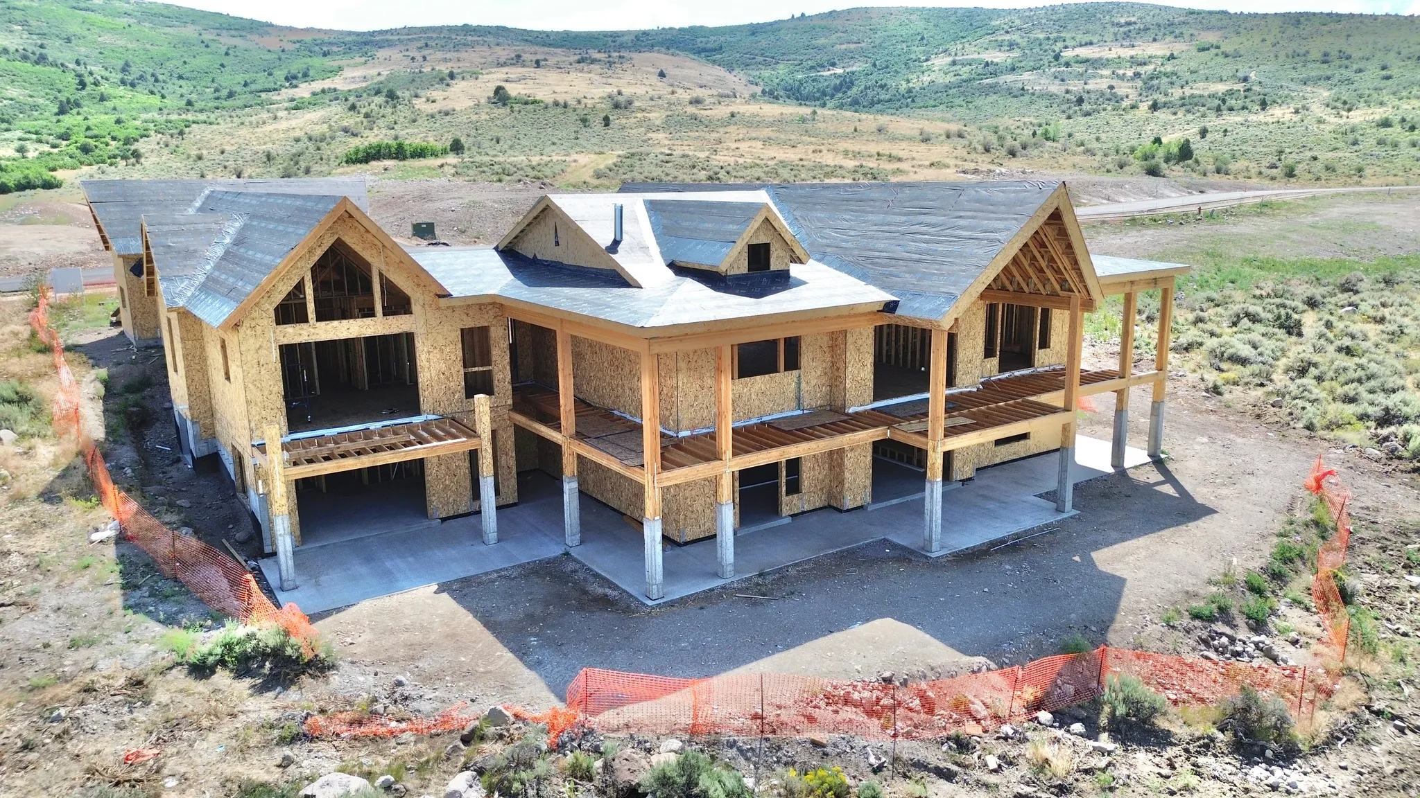 Newly constructed residence featuring a prominent gable roof design