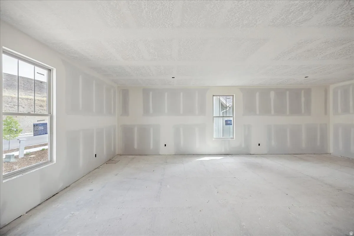 HUGE Bonus room over garage. Big enough for theater, gym, game room, etc.