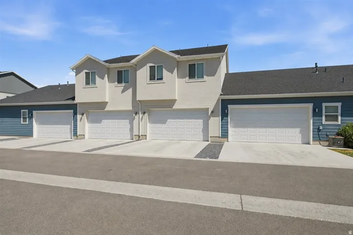 Multi-unit property featuring contemporary siding and stucco exteriors