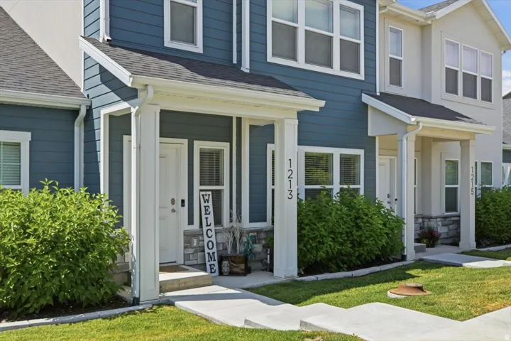Blue siding exterior with stone accent facade