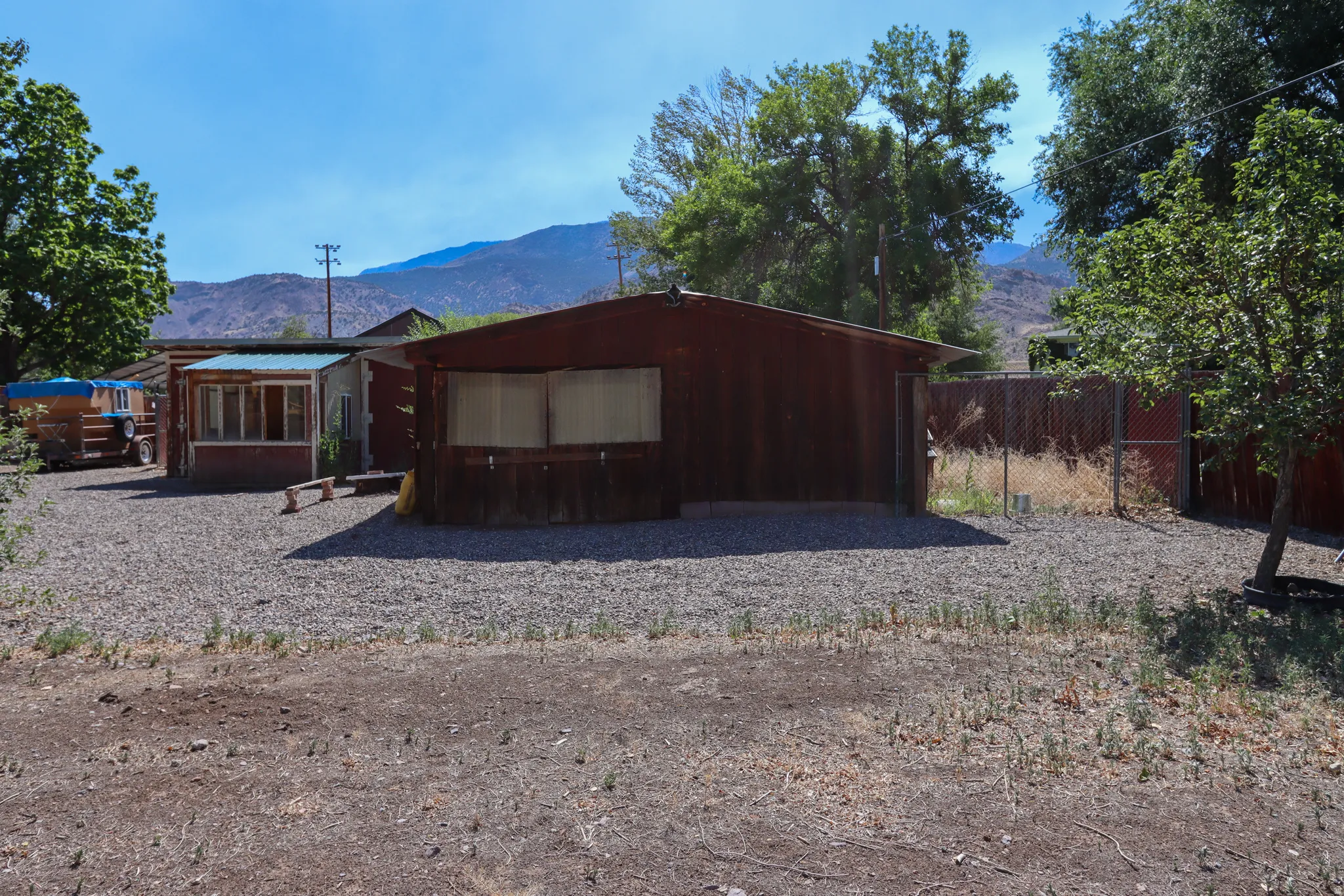 Single-story residence with a metal roof and a covered porch