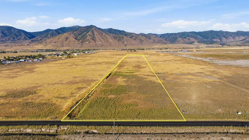 Expansive undeveloped land parcel with frontage on a paved road