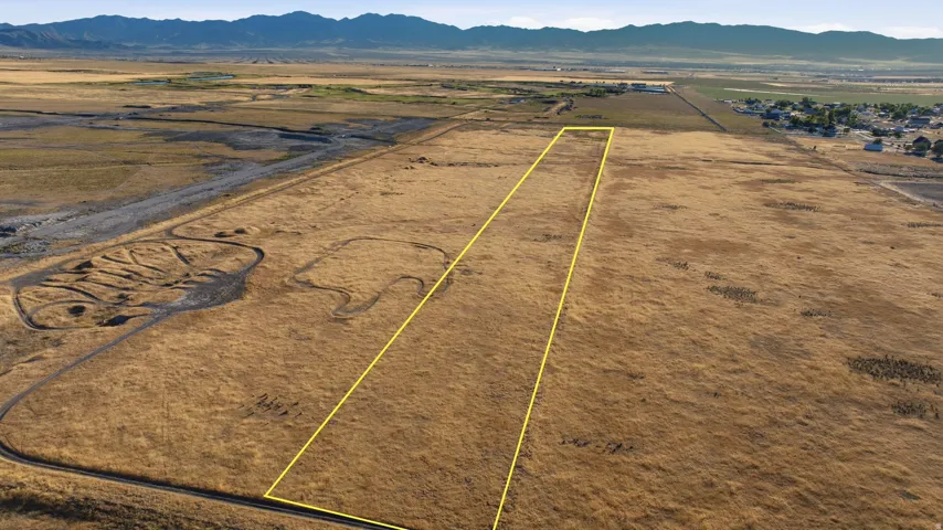 Expansive undeveloped land parcel with marked boundaries