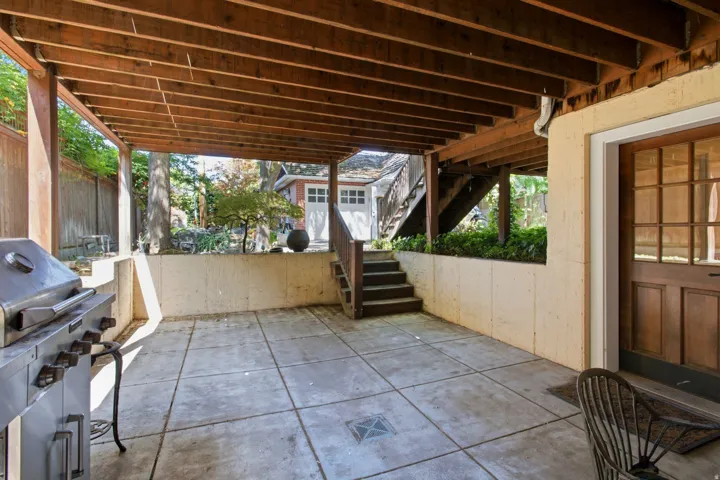Covered patio featuring a concrete slab floor