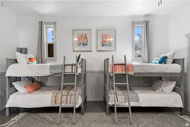 Dual gray bunk beds with integrated ladders