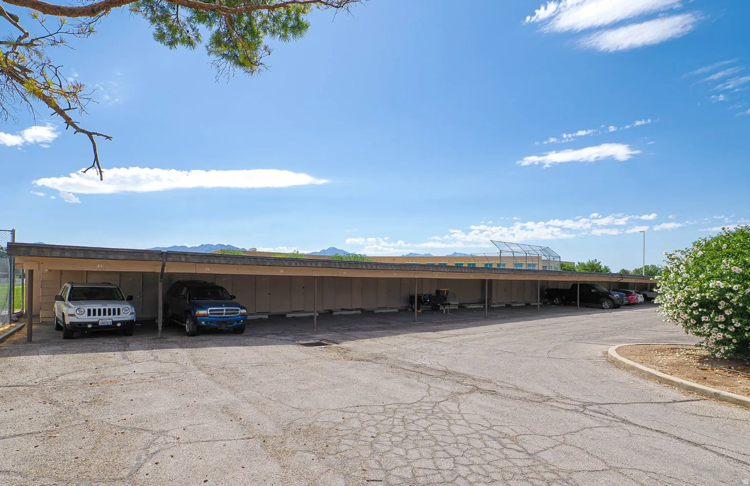 Covered parking with private storage unit for each home