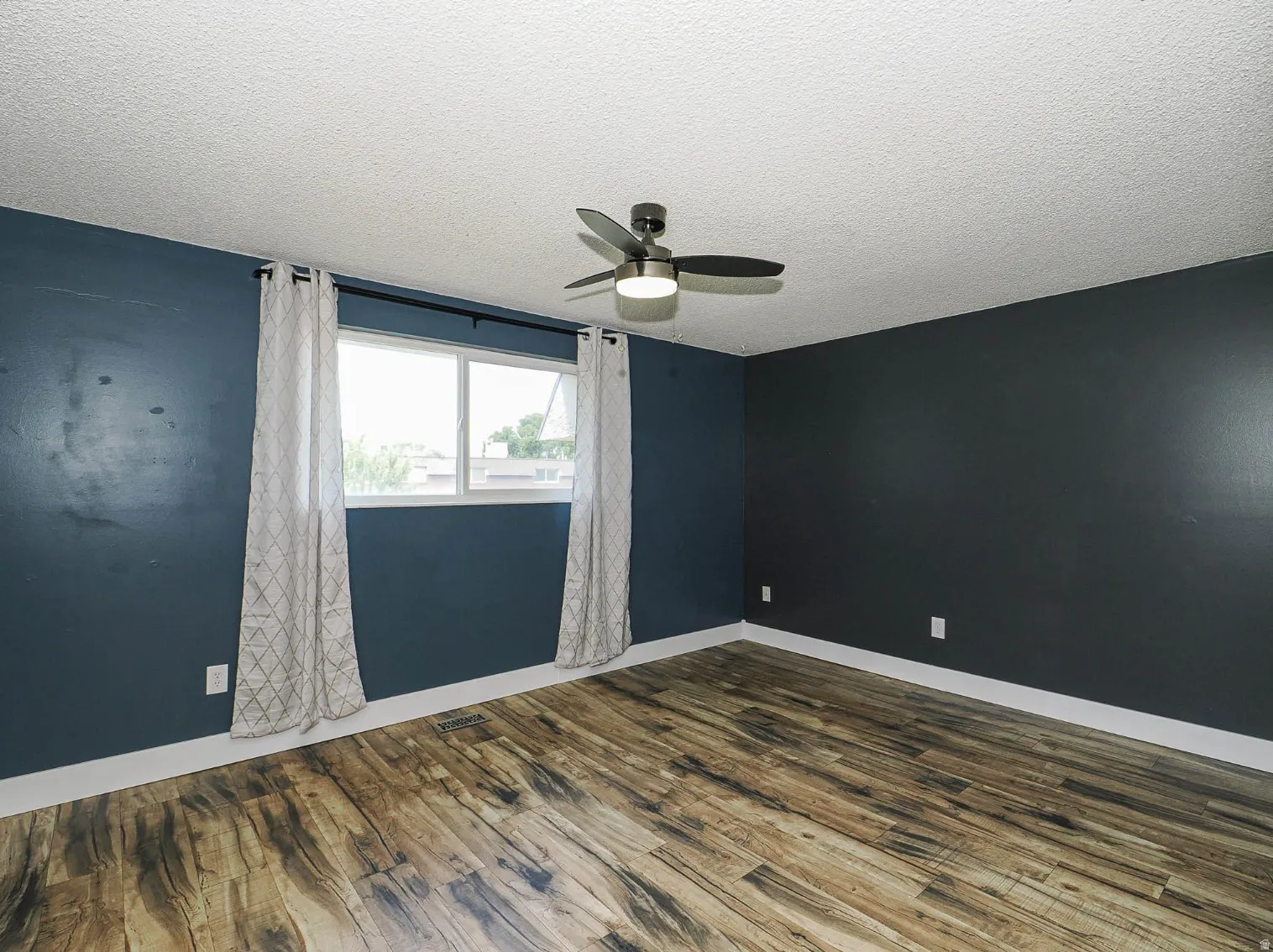Good sized bedroom with large double pane window