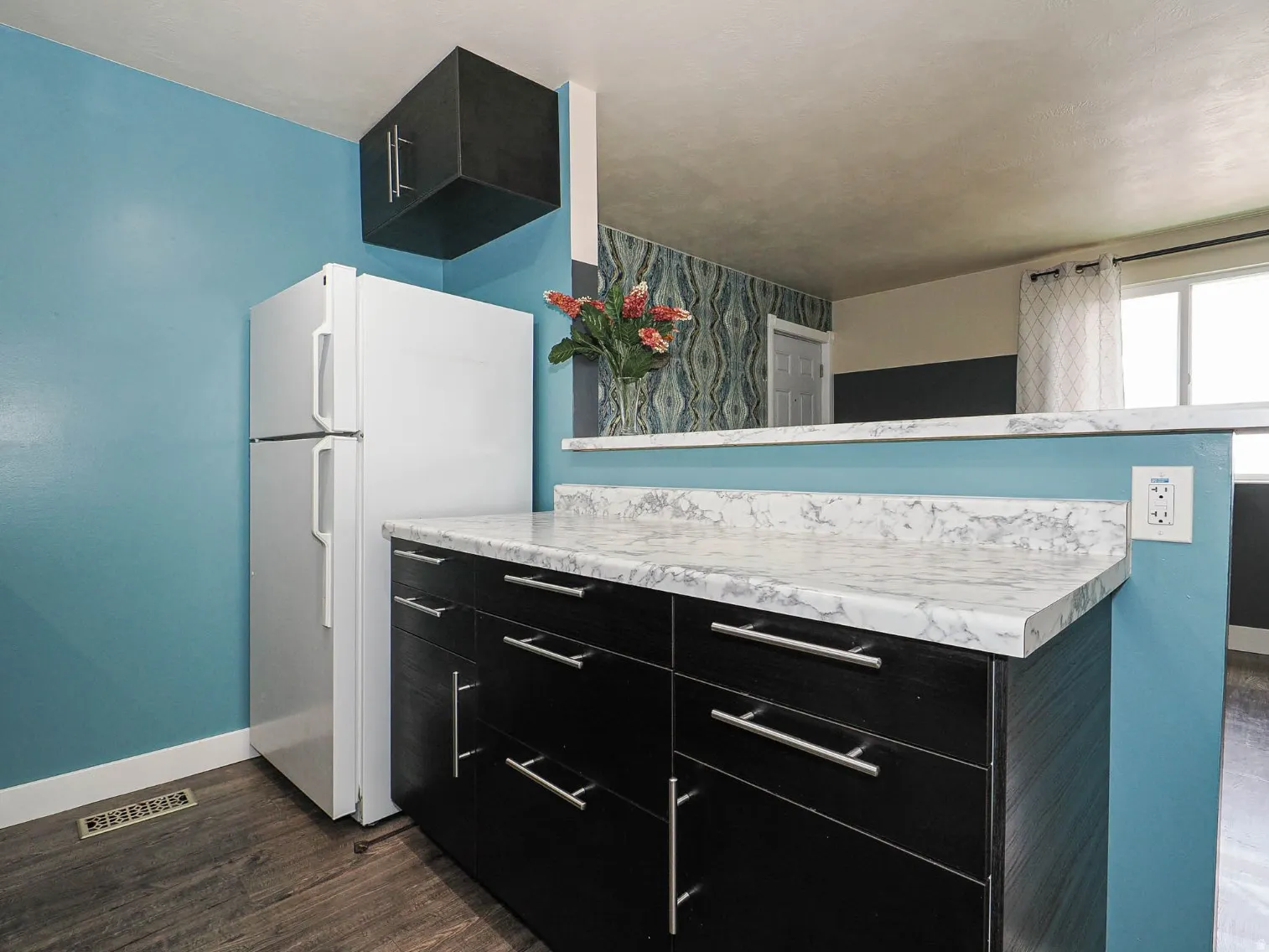 All new cabinets and counters in updated kitchen