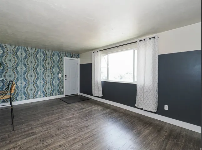 Fun wallpaper and large window in the great room