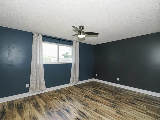 Good sized bedroom with large double pane window