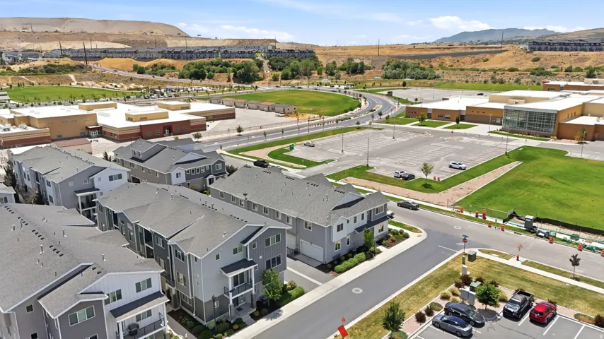 Modern townhome community featuring multi-story units with attached garages
