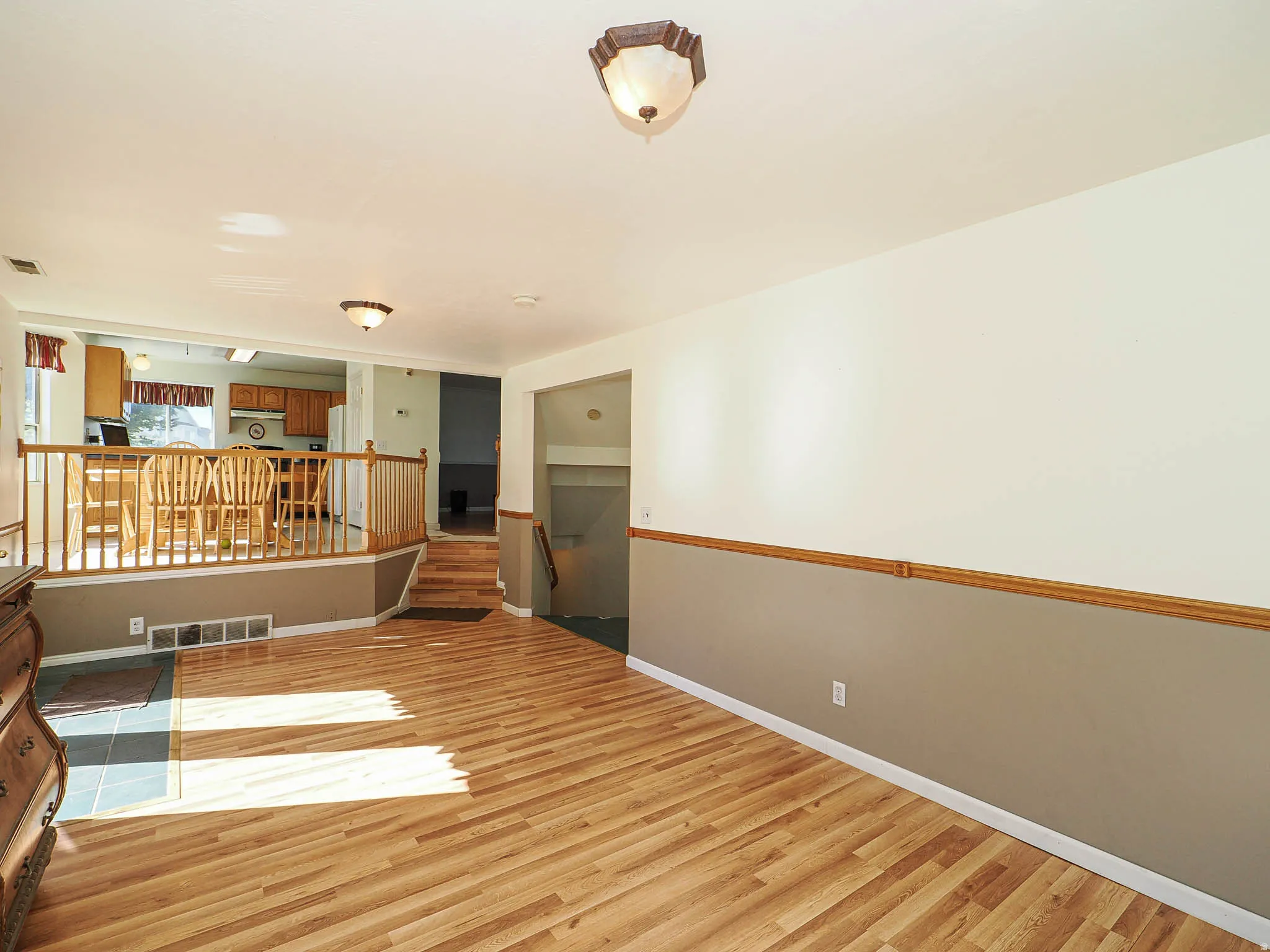 Wood-finish flooring throughout the main level