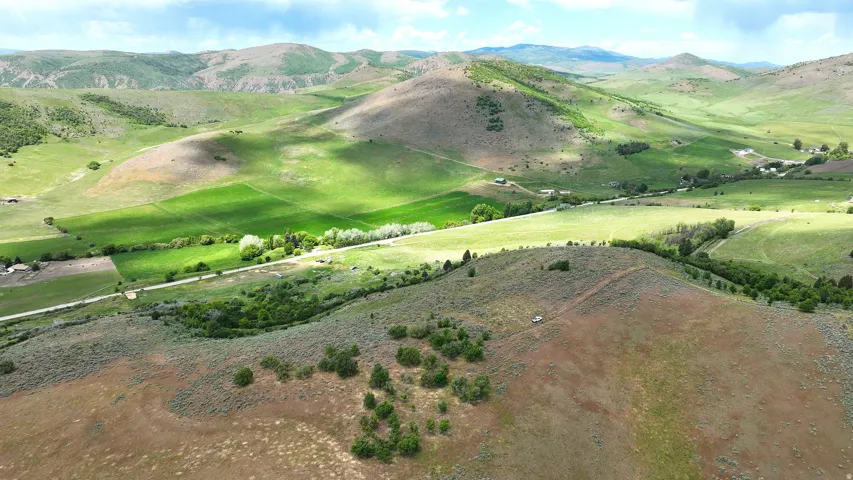 Expansive natural landscape featuring rolling hills and valleys