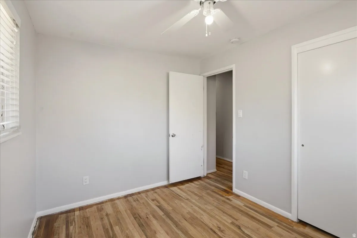 Neutral-toned interior featuring wood-finish flooring
