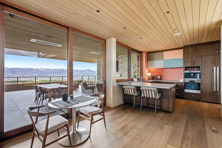 Expansive outdoor patio with mountain scenery