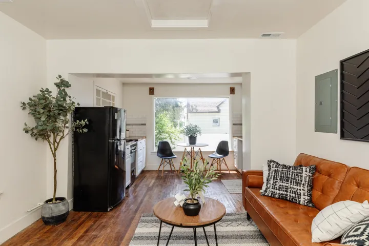 Integrated living area with wood-finish flooring