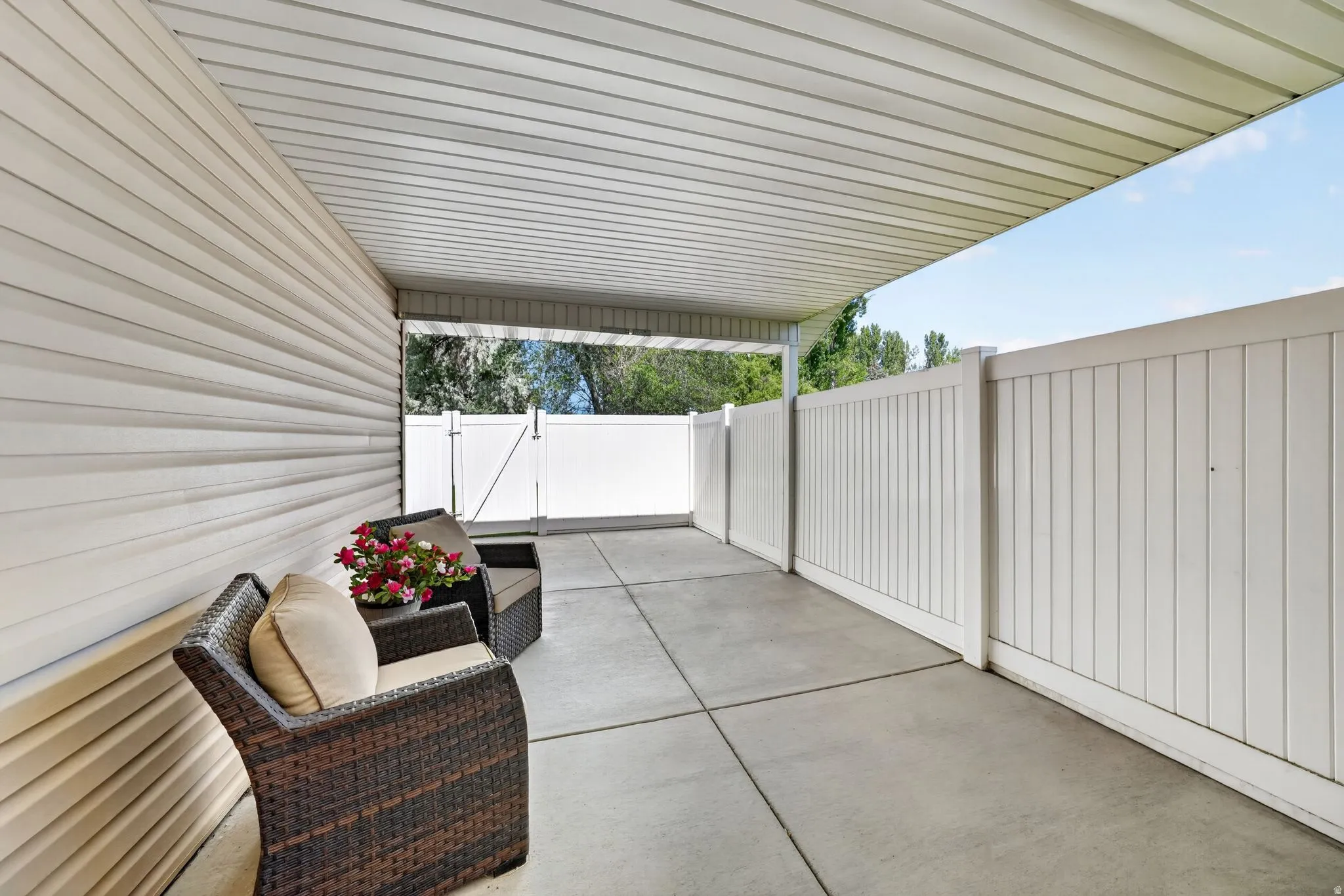 Covered patio featuring a concrete slab floor