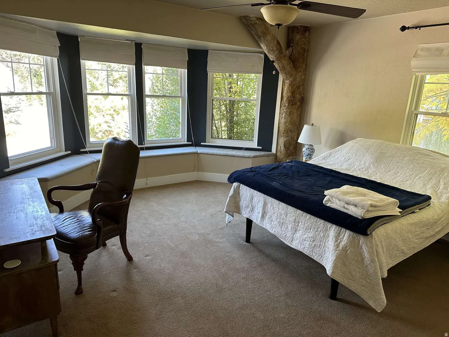 Bay window with three double-hung windows and integrated window seating