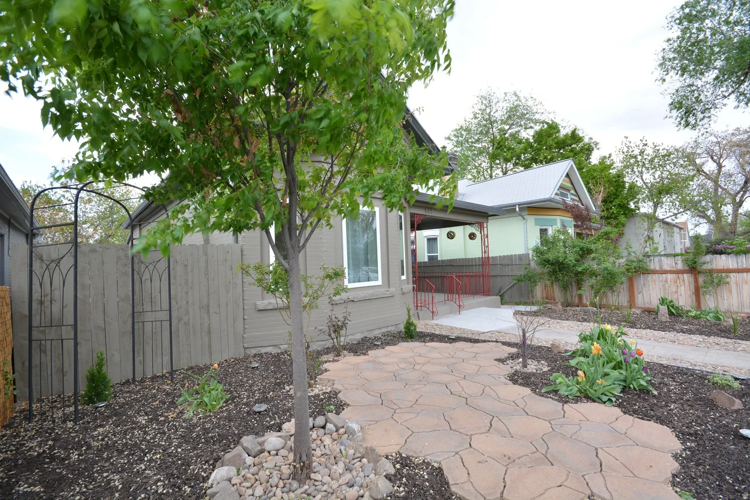 Fully-landscaped front garden.