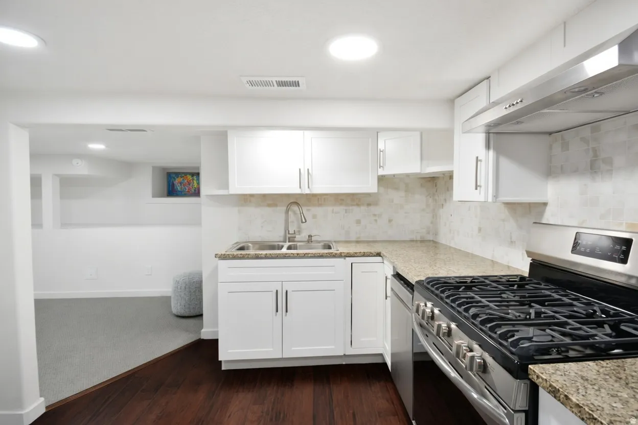 Granite countertops in basement second kitchen.