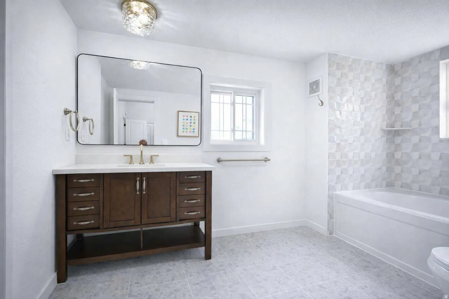 Elegant private ensuite bathroom for bedroom 2 on main floor.