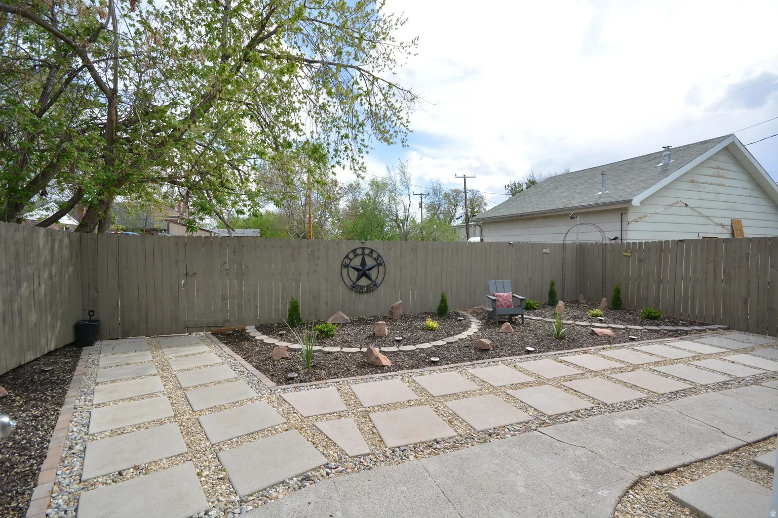 Pavers and mulch offer low-maintenance garden.
