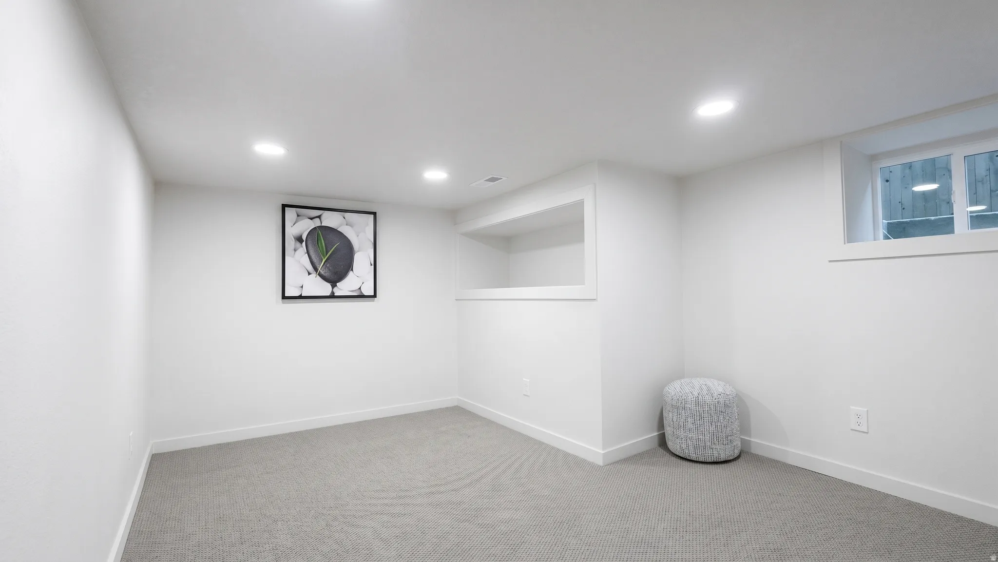 Multi-function bonus/flex room with for storage, office or guest use with shelves and convenient storage nooks.