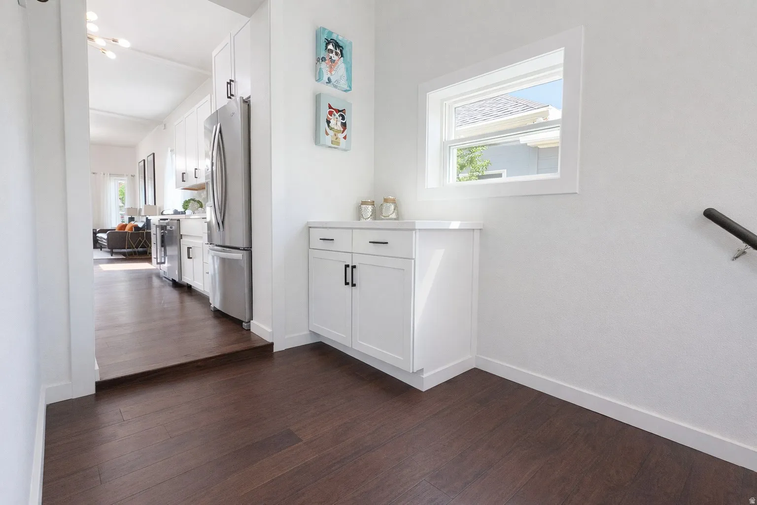 Storage cabinet with quartz countertop.