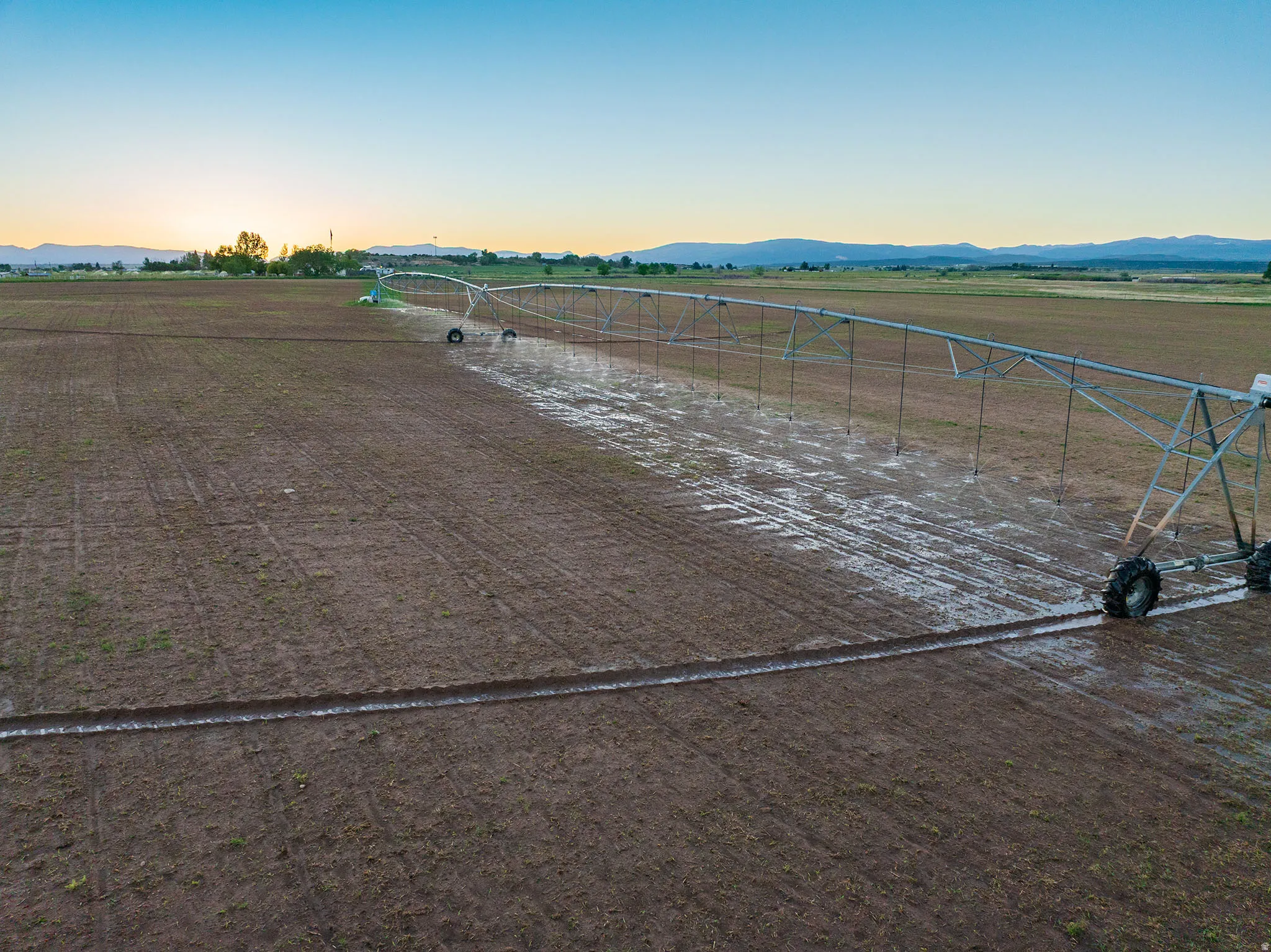Expansive agricultural field with an operational center pivot irrigation system