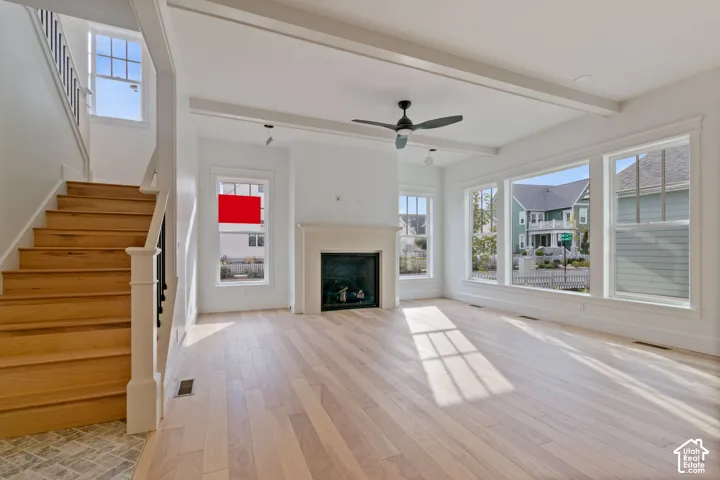 Light wood-finish flooring with an integrated staircase