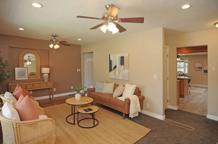 Recessed lighting, ceiling fans, and a wide entryway