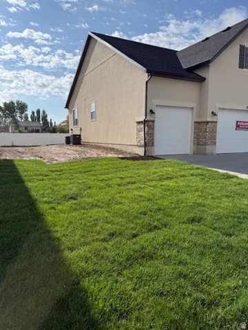 Large side yard with back fence already installed. Dual Furnace and AC units. 3 car garage, front yard landscaping included.