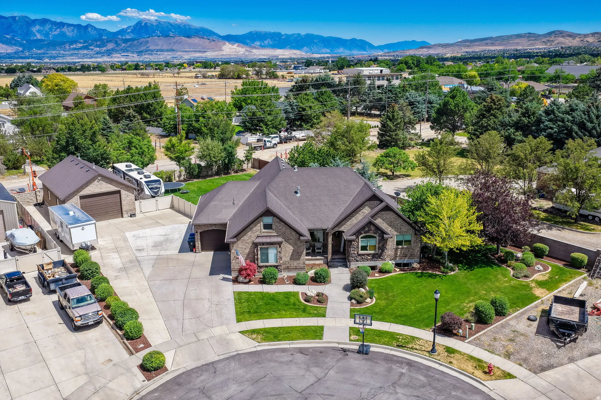 Ariel view of the front of the home and detached garage.