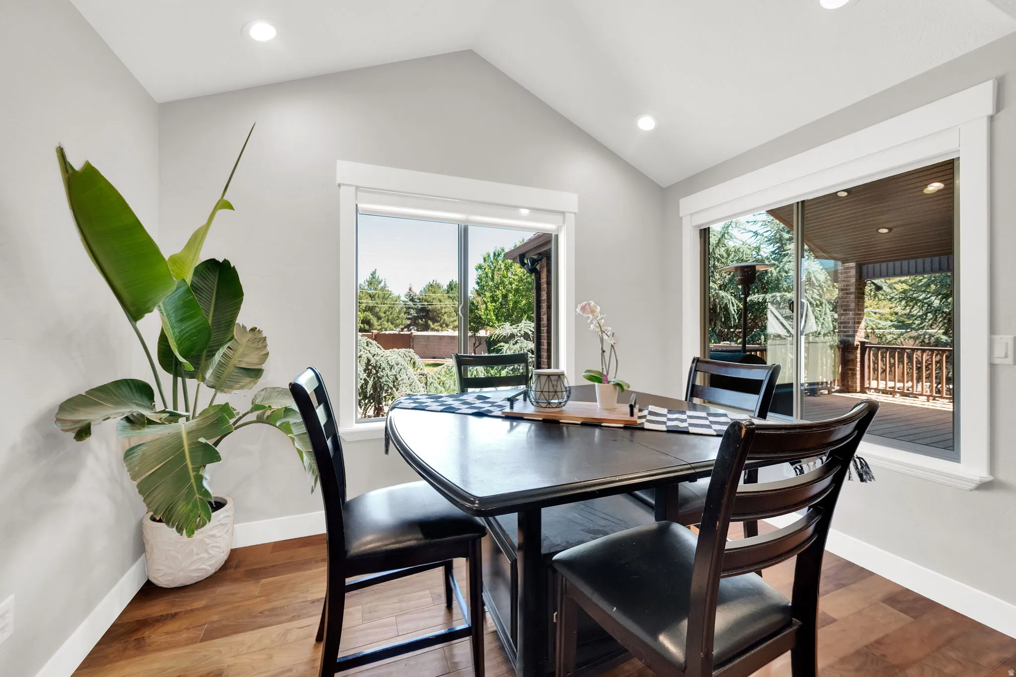 Dining cove with access to covered deck.