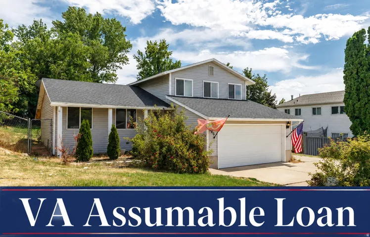 Split-level home, with two car garage.