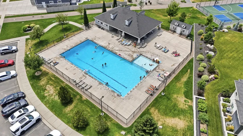 Pool 1 offers a lap lane, sun deck, and a clubhouse with covered outdoor seating.