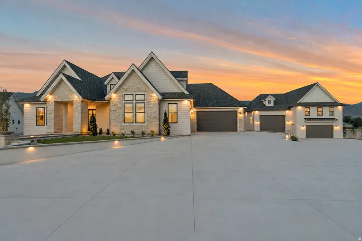 Stone and siding exterior with multiple gables