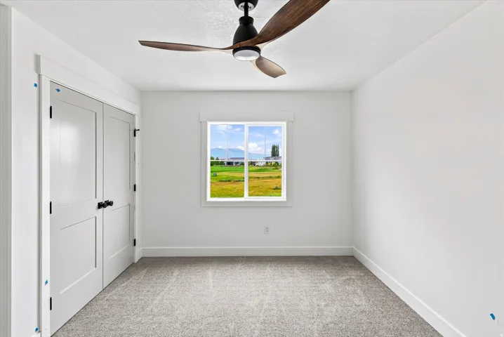 Neutral-toned carpeting paired with white walls