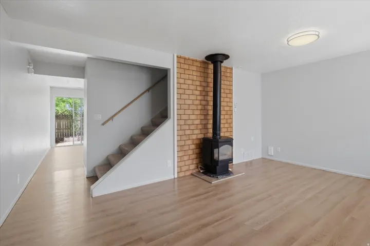 View of stairs and hallway to kitchen
