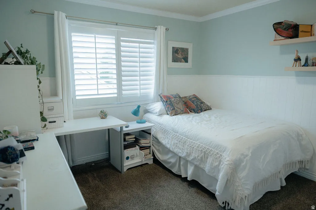Bedroom #2 is located upstairs at the end of the hallway. It is a good size room a peaceful wall paint and neutral carpet.