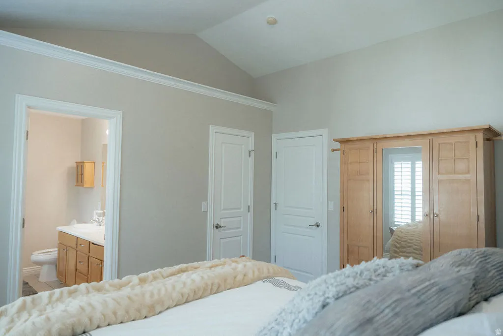 The vaulted ceiling, two tone paint and crown molding make this room shine.
