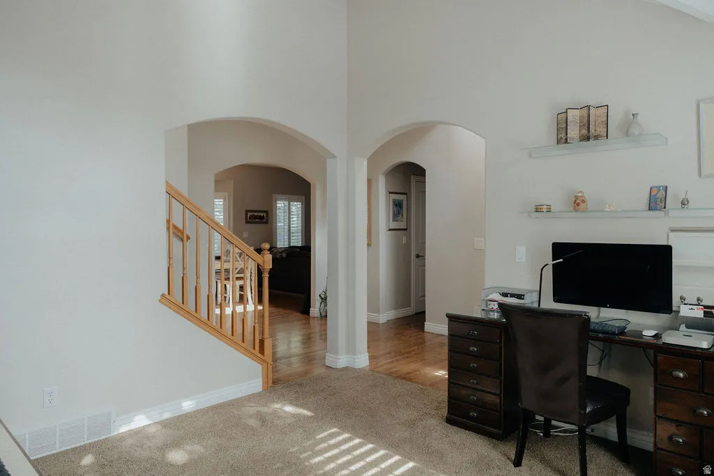 Arched doorways opening to additional spaces