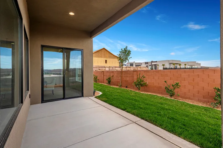 Covered patio with concrete flooring, recessed lighting, and sliding glass doors