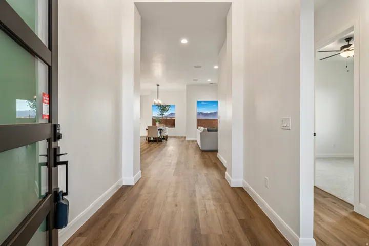 Entryway featuring wood-finish flooring and recessed lighting