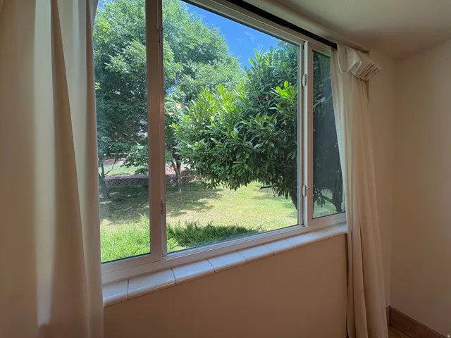 Expansive window offering abundant natural light