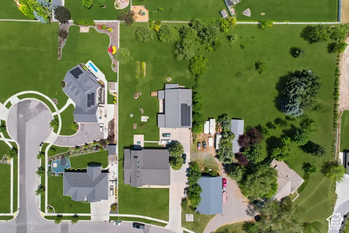 Expansive property with a large, green parcel